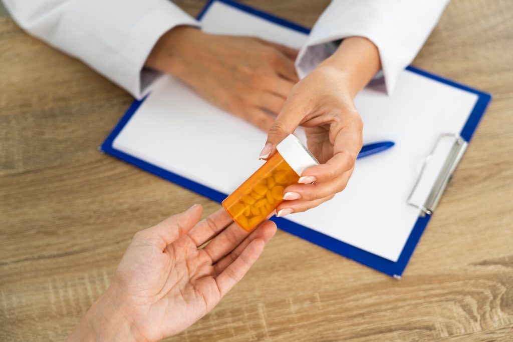 Patient receiving information about weight loss medication alternatives at PracticeRx.