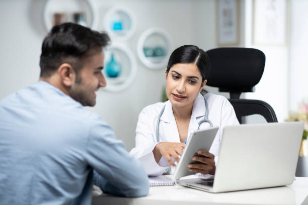 At Practice RX, a women concierge doctor helping a small business health employee with a health plan starting at $69/month